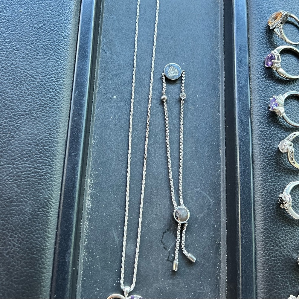A lot of fine sterling silver jewelry and precious stones